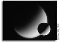 Image: Rhea and Titan as Seen By Cassini