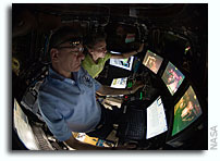Photos: Inside the Space Station Cupola Controlling Candarm2 as it Moves HTV2