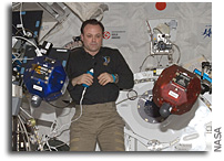 Photo: Astronaut Ron Garan Works With SPHERES on The International Space Station