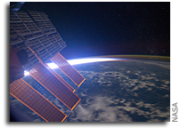 Photo: Space Station Solar Panels, Aurora, As Seen Over The Central Pacific Ocean
