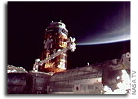 Japanese Kounotori3 H-II Transfer Vehicle Berthed to International Space Station