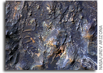 NASA MRO Image of Mars: Uplifted Jumble of Ancient Bedrock