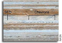 Cassini Spies Wave Rattling Jet Stream on Jupiter