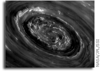 Peering into the Storm at Saturn's North Pole