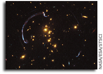 Hubble Zooms In on a Magnified Galaxy