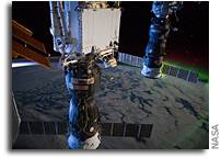 Image: Space Station, Soyuz, and Progress Fly Over Nightside of Earth