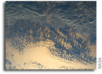 Photo: Sunglint and clouds off Western South America As Seen From Space