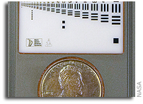 Mars-Bound Rover Carries Coin for Camera Checkup