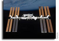 Space Station Crews Hold News Conference From Orbit